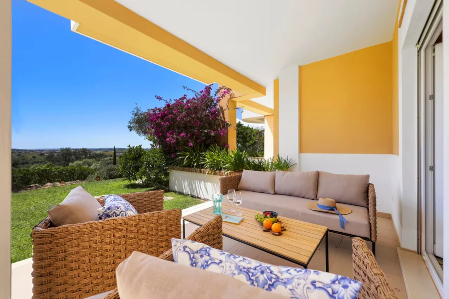 Lush villa gardens with seating areas
