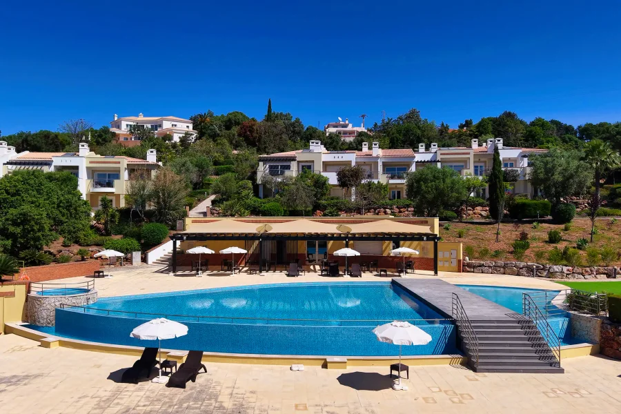 Aerial view of villa infinity pool with sun loungers