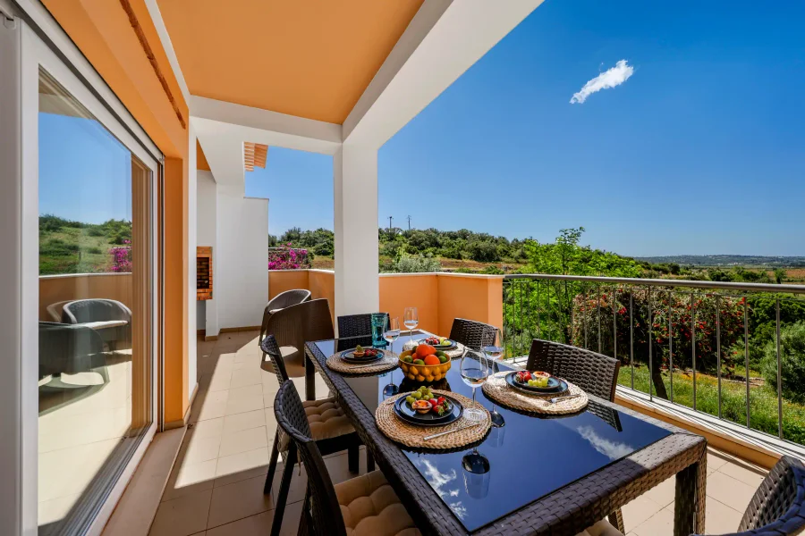 Alfresco dining on the villa terrace with panoramic views